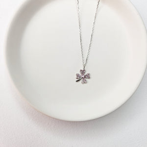 A beautiful design featuring a graceful four-leaf clover handcrafted in Sterling Silver and plated in 14 K Gold, the Lucky Clover and Sparkles Necklace showcases tiny cubic zirconia stones ( pink or white). Recognized as the universal symbol of good luck, this clover pendant necklace can be a wonderful gift for any occasion. Options:      Sterling Silver with14 K White Gold Plating and Pink Zirconia Stones Sterling Silver with 14 K Yellow Gold Plating and White Zirconia Stones