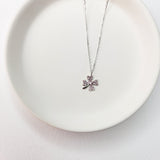 A beautiful design featuring a graceful four-leaf clover handcrafted in Sterling Silver and plated in 14 K Gold, the Lucky Clover and Sparkles Necklace showcases tiny cubic zirconia stones ( pink or white). Recognized as the universal symbol of good luck, this clover pendant necklace can be a wonderful gift for any occasion. Options:      Sterling Silver with14 K White Gold Plating and Pink Zirconia Stones Sterling Silver with 14 K Yellow Gold Plating and White Zirconia Stones