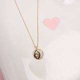  The Moon and Stars Necklace is masterfully crafted in Sterling Silver and plated in Champagne Gold. The pendant featured shell for the outline of the moon representation and cubic zirconia stones to symbolize the stars. What a beautiful piece of jewelry to show appreciation to a love one or celebrate yourself. 